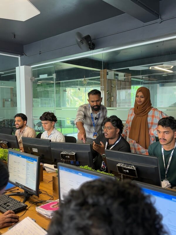 Students practising with mentors in the Aced Academy lab